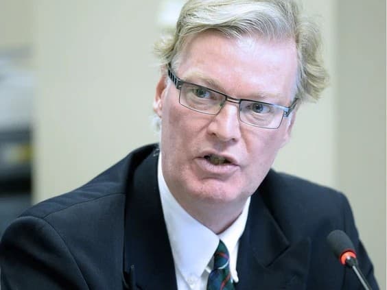 Justice Neil  Robertson